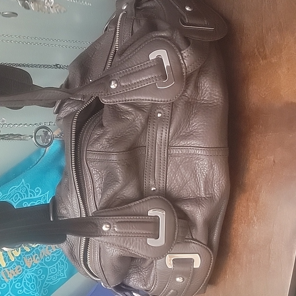 Brown leather purse and matching wallet